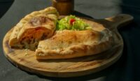 Marc Hotel dan The Sasak Bistro & Bar menghadirkan Cheese Lovers Calzone